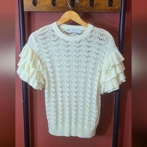 White ruffle sleeve pointelle knit top